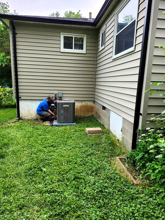 Eric servicing a residential AC unit